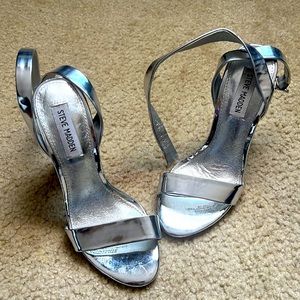 Steve Maddens size 7 silver ankle wrap heel - about 3”